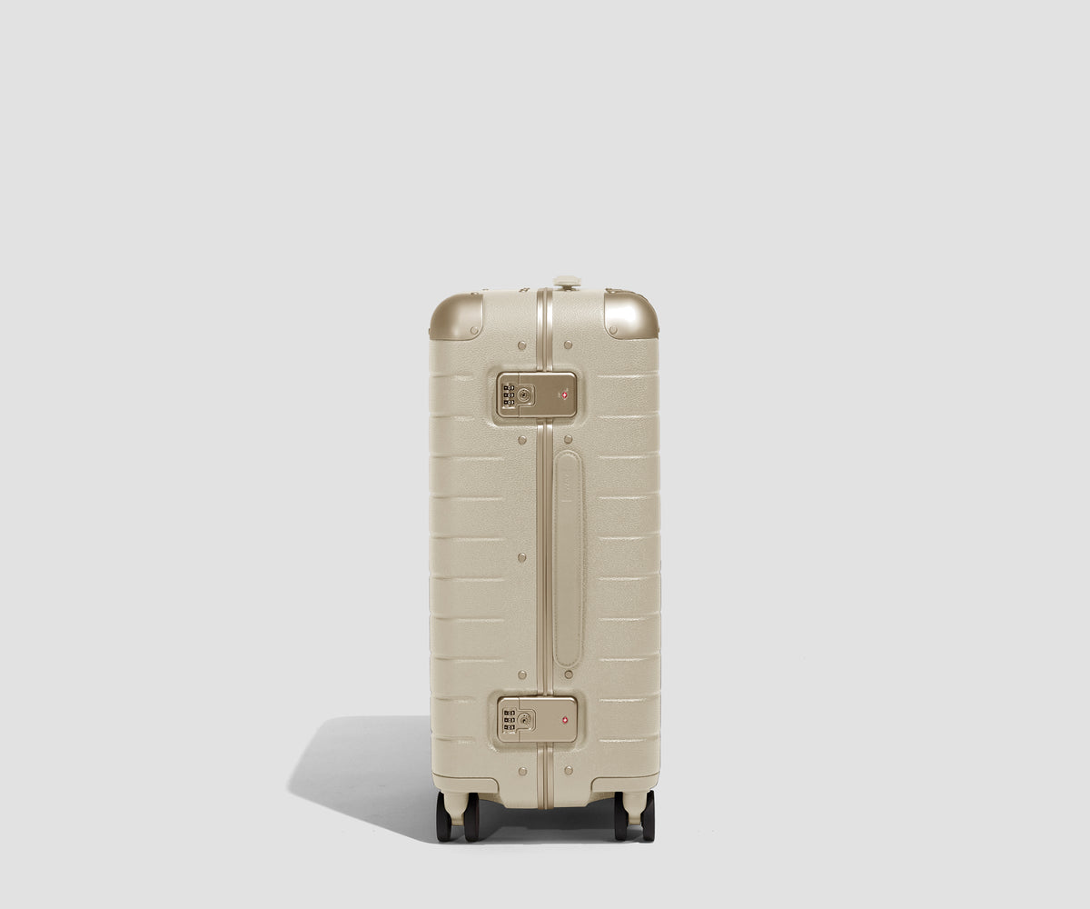 The Aluminum Edge Bigger Carry-On in Champagne White