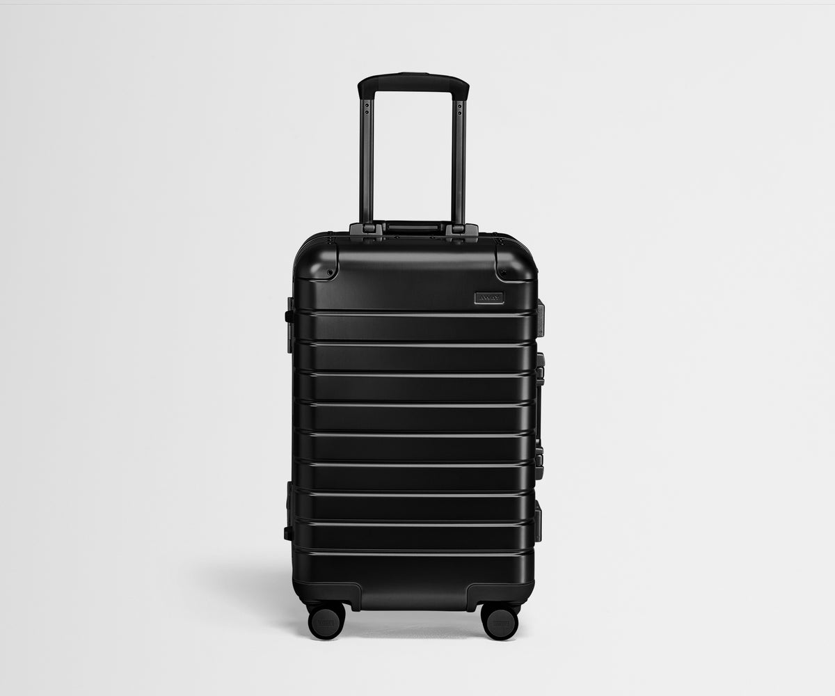 Front view of an Aluminum Bigger Carry-On with handles raised