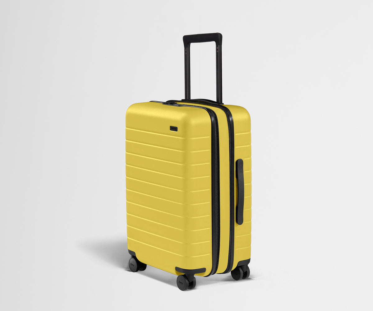 The Bigger Carry-On Flex in Sunshine Yellow
