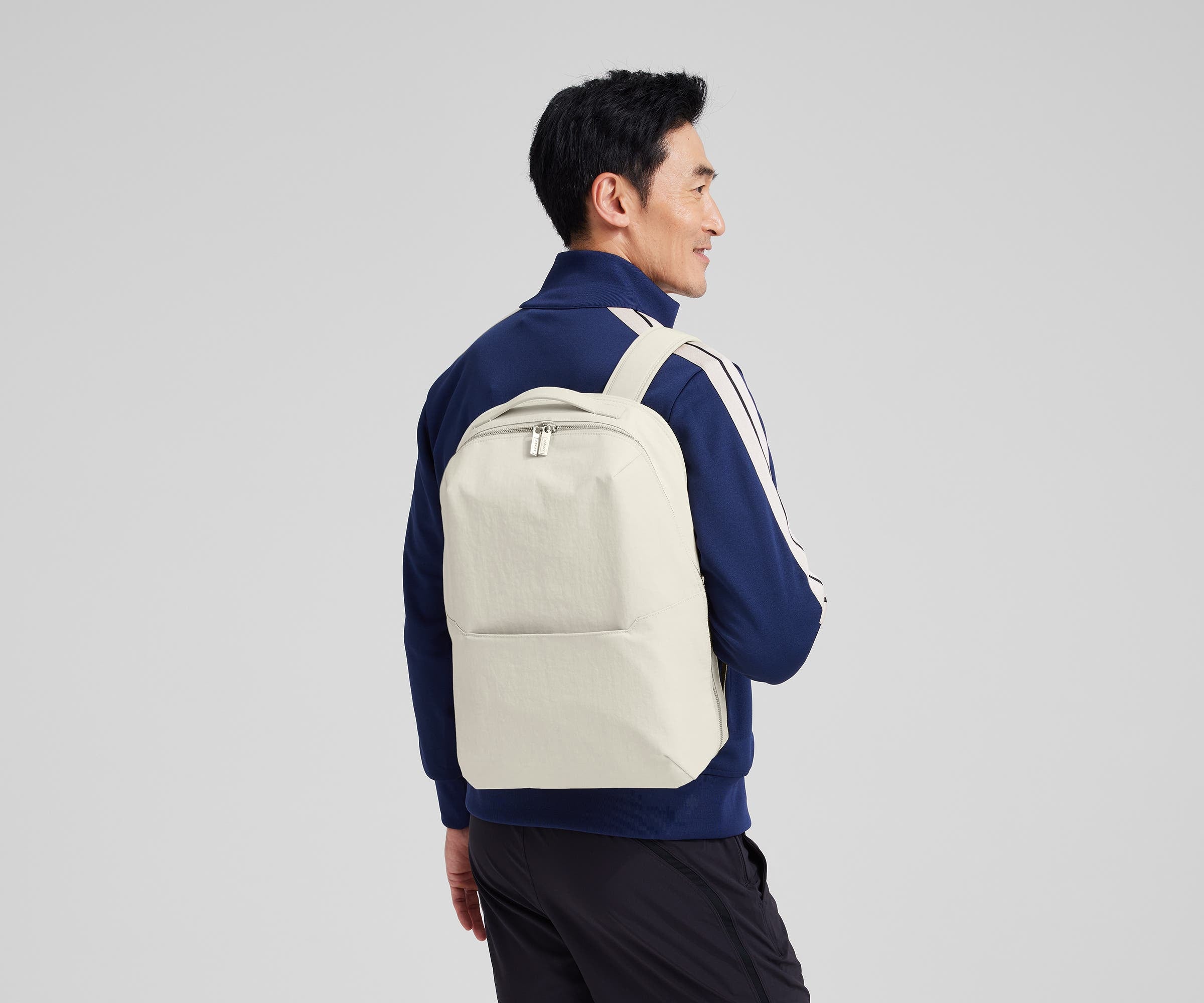 Person wearing the Courtside Everywhere Zip Backpack on their shoulder