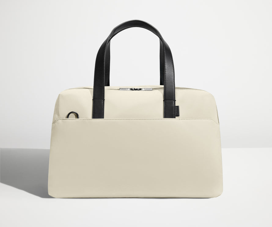 Front view of The Overnight Bag with leather straps up