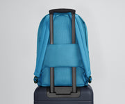 Active Backpack 26L secured to an Away suitcase