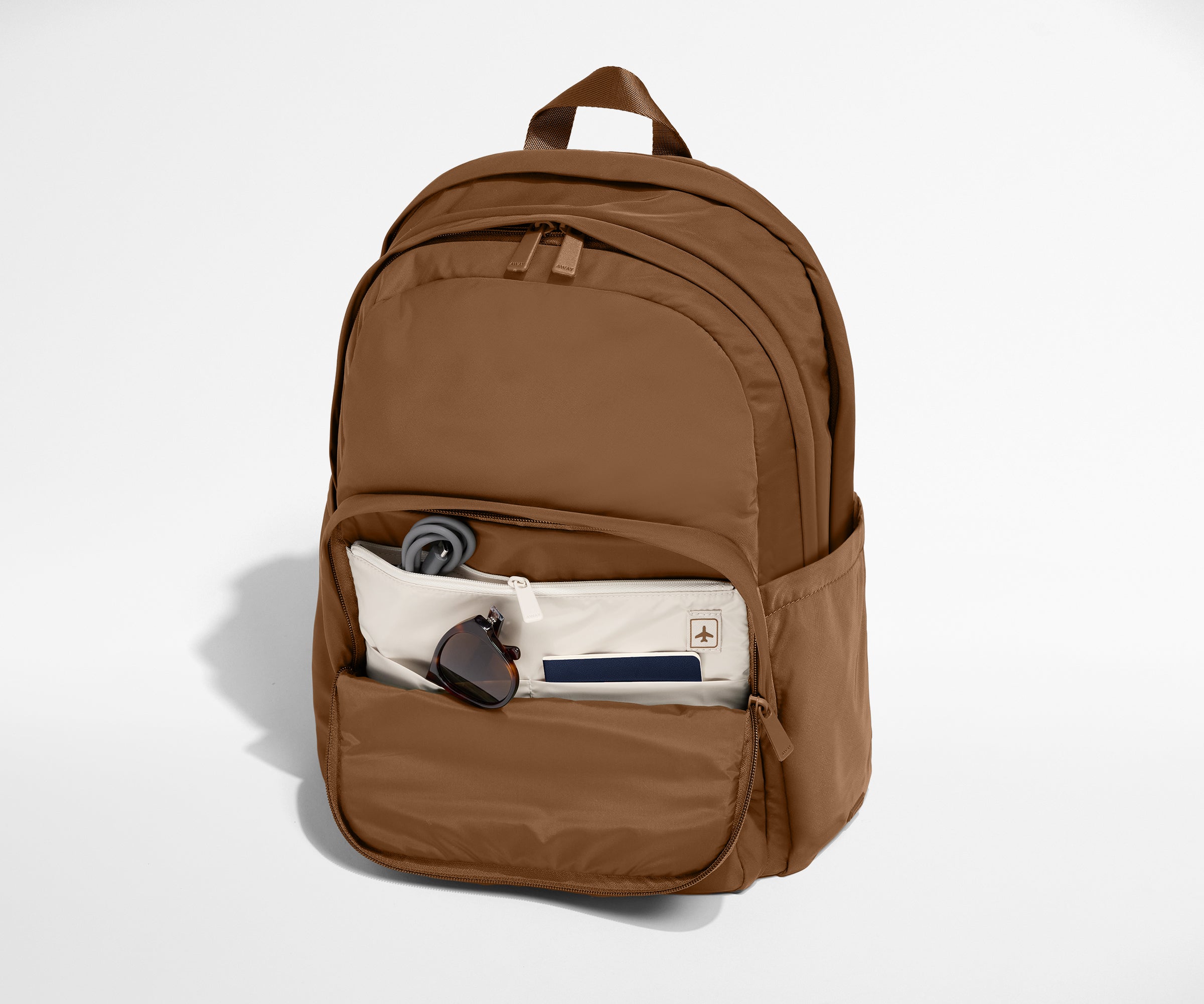 Away Large Featherlight Backpack in Amaro Brown