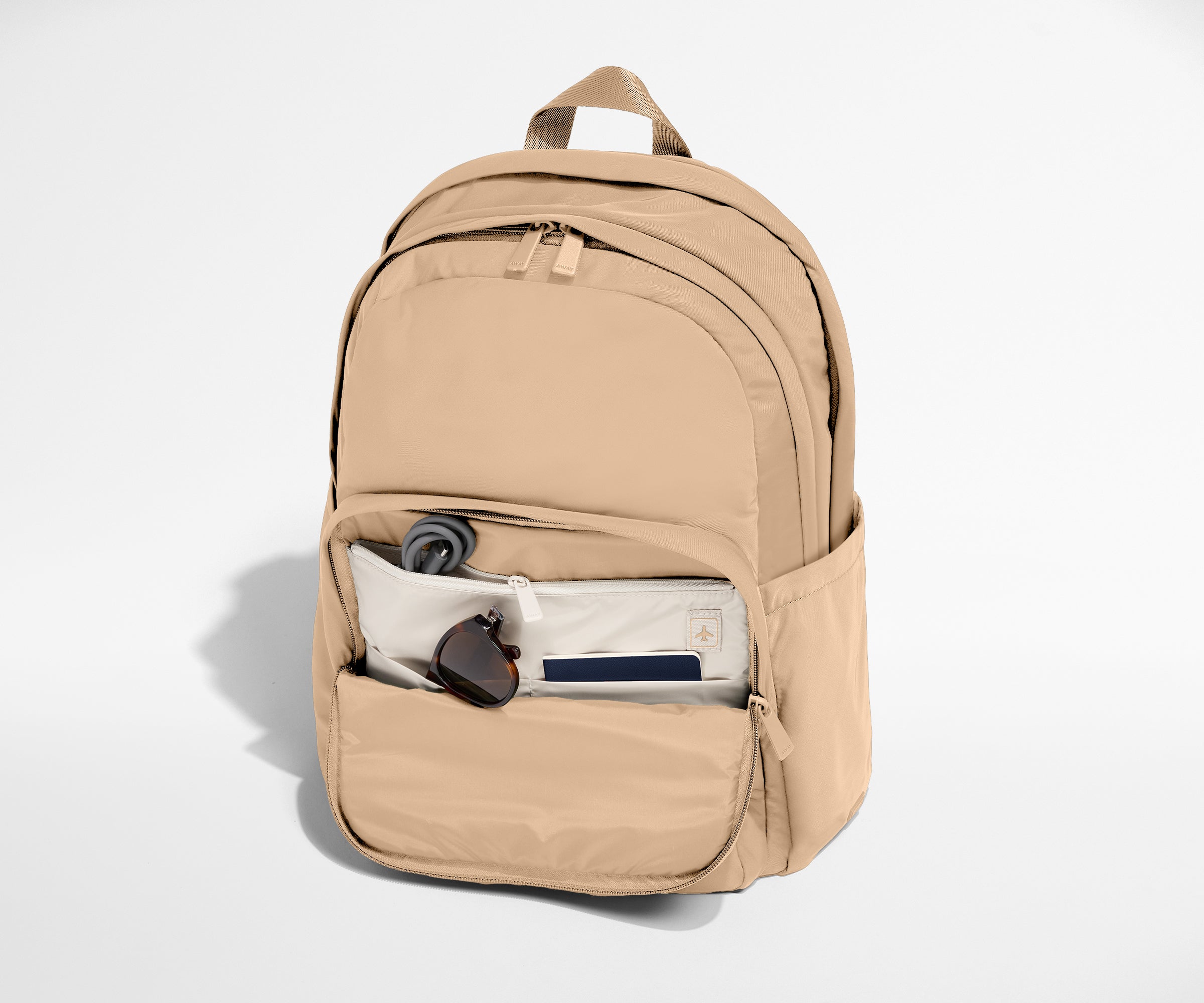 beige backpack laptop Away Large Featherlight Backpack in Camel Brown
