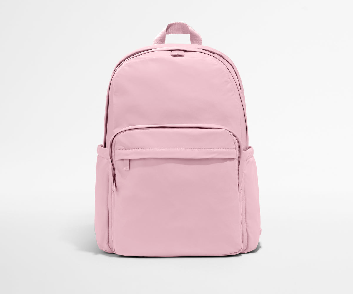 Pink backpack on a light gray background