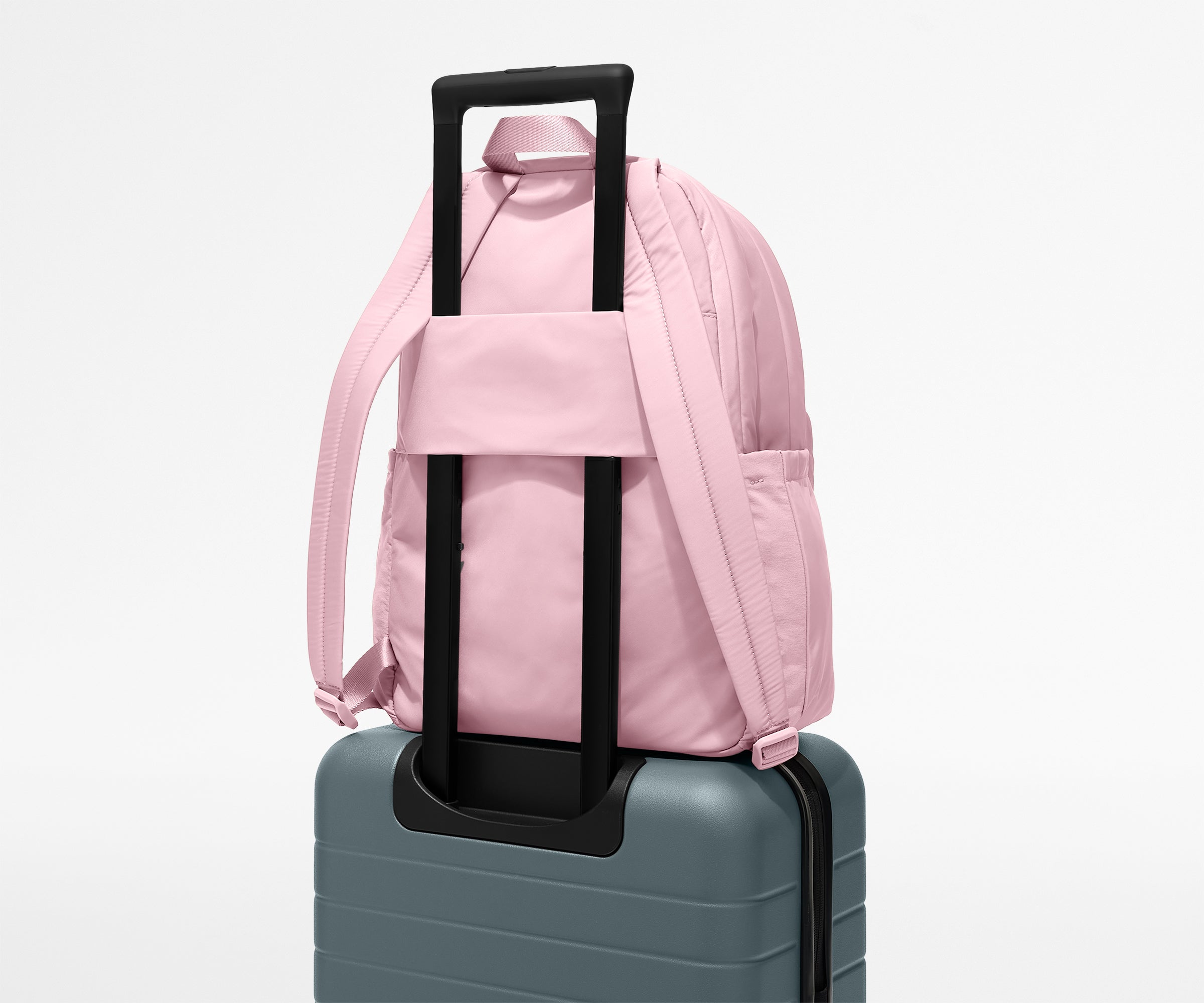 Away Large Featherlight Backpack in Glacial Pink