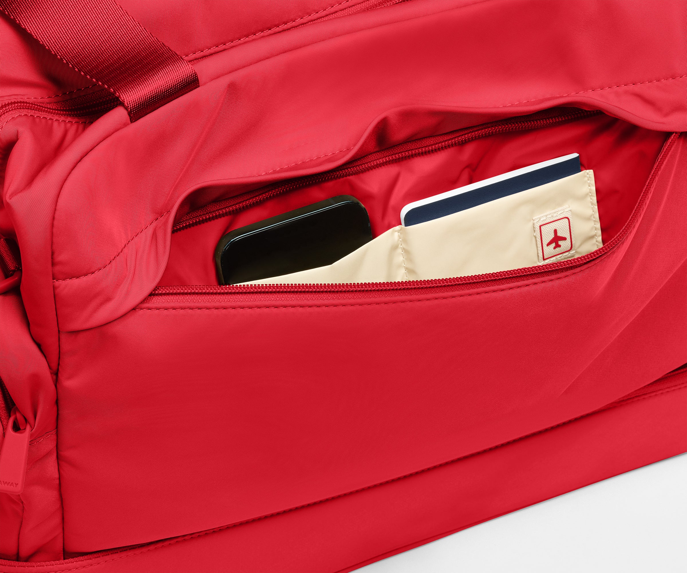 Featherlight Overnight Bag in Cherry Red