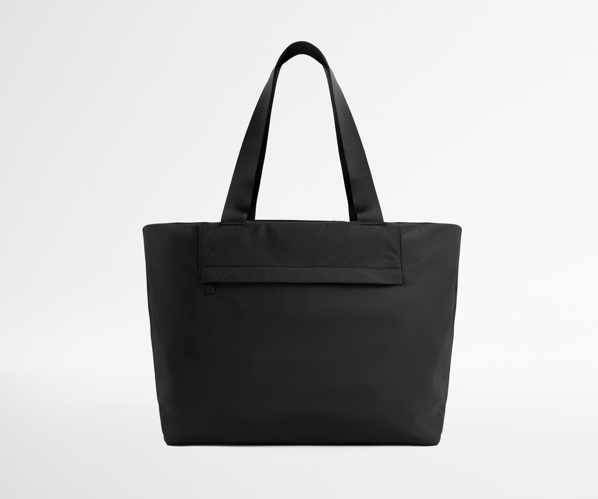 black tote travel bag Lo & Sons Catalina Deluxe - Recycled Poly resistant nylon and leather trim Travelpro Essentials Sparepack Foldable Carry-On