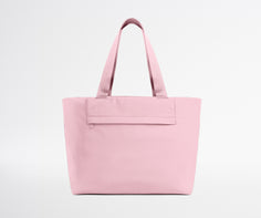 Pink tote bag on a light gray background