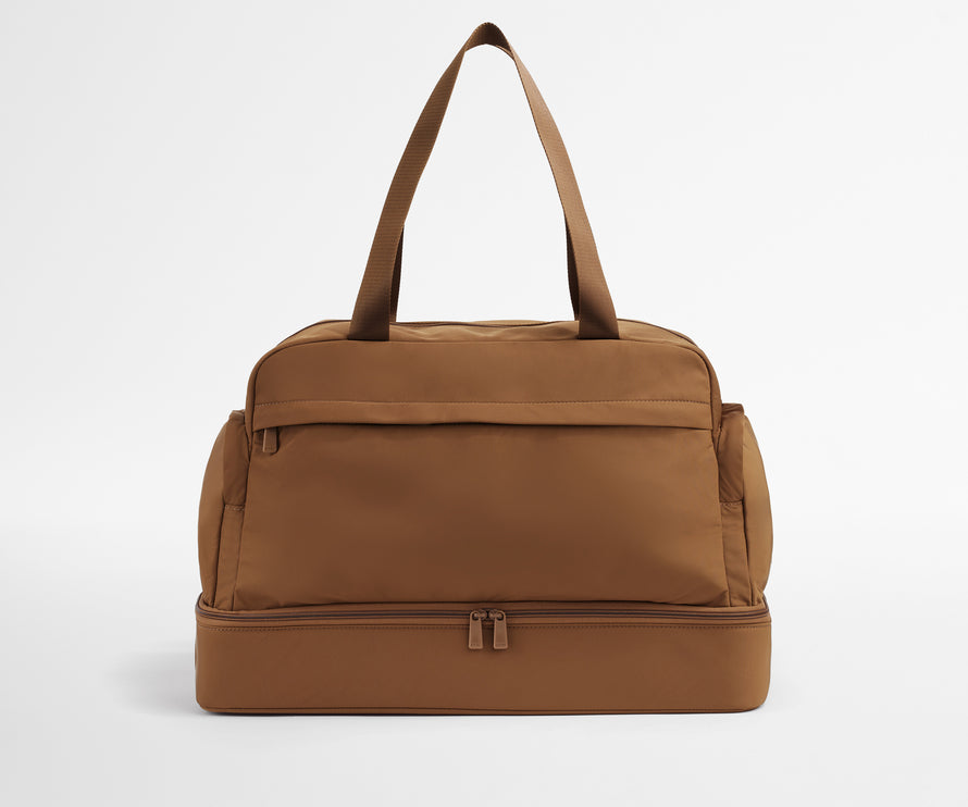 Front view of Featherlight Weekender with the handles up