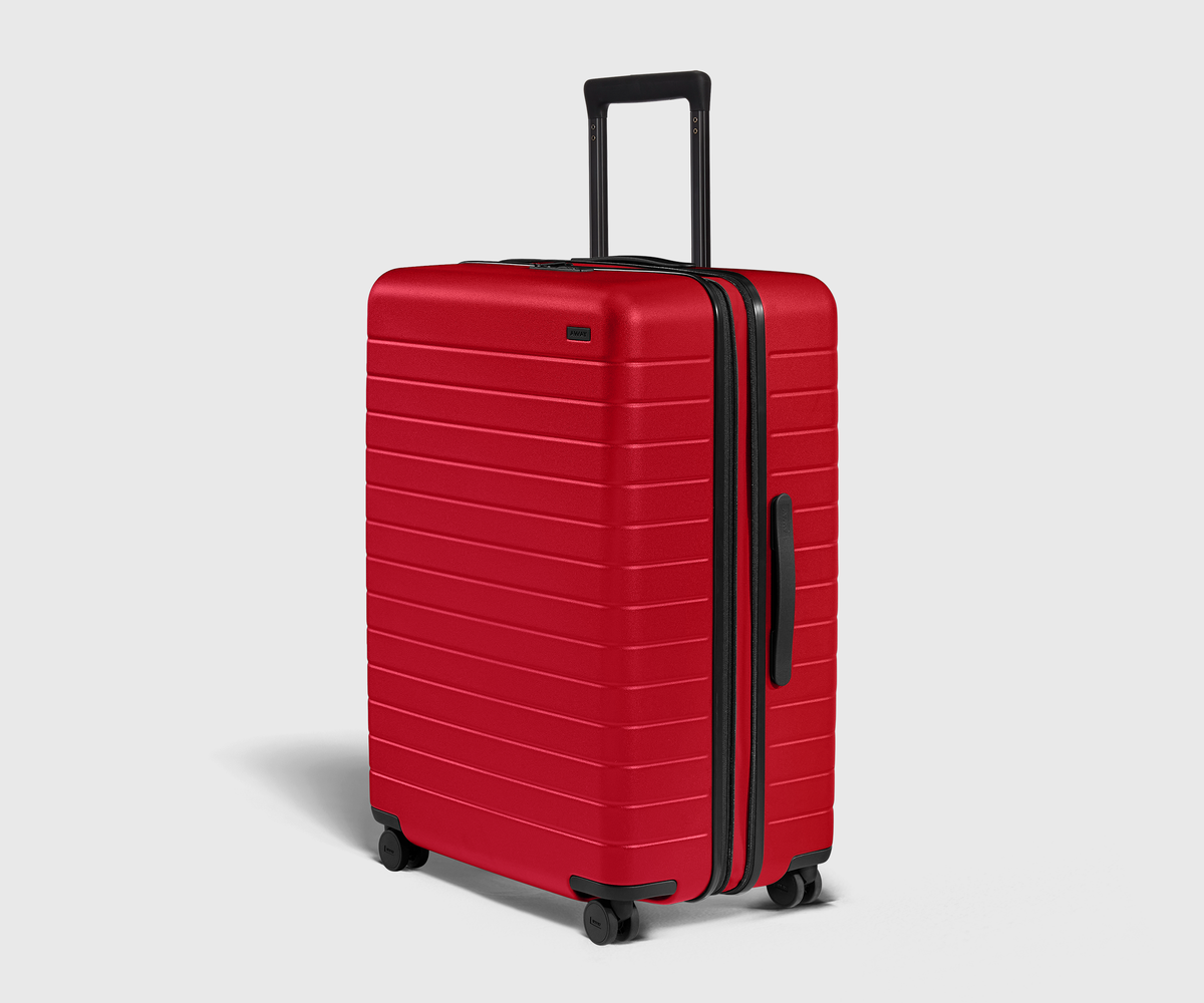 Large Expandable Suitcases: Cherry Red | Away Large Expandable Suitcases: Cherry Red | Away