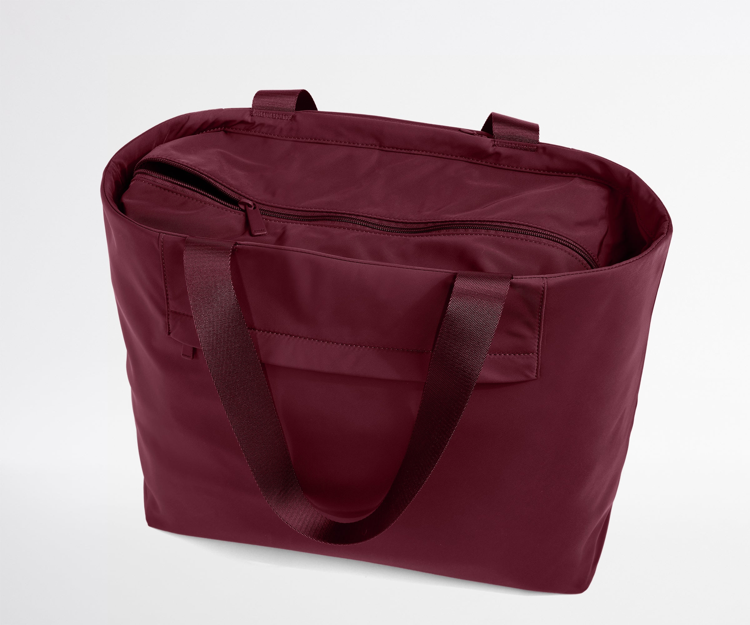 Maroon tote bag on a white background