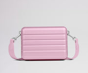 Pink crossbody bag on a light gray background