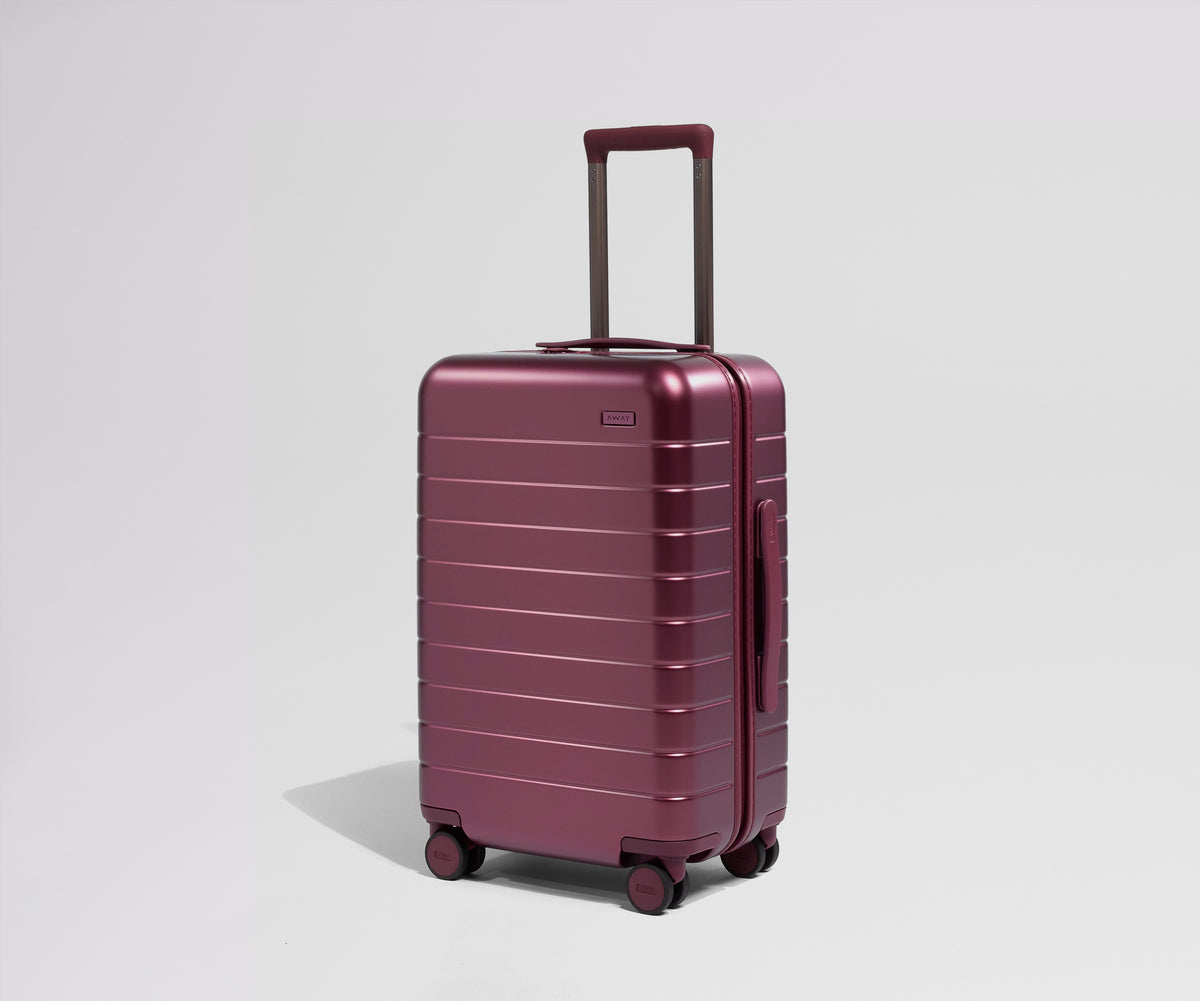 A maroon suitcase