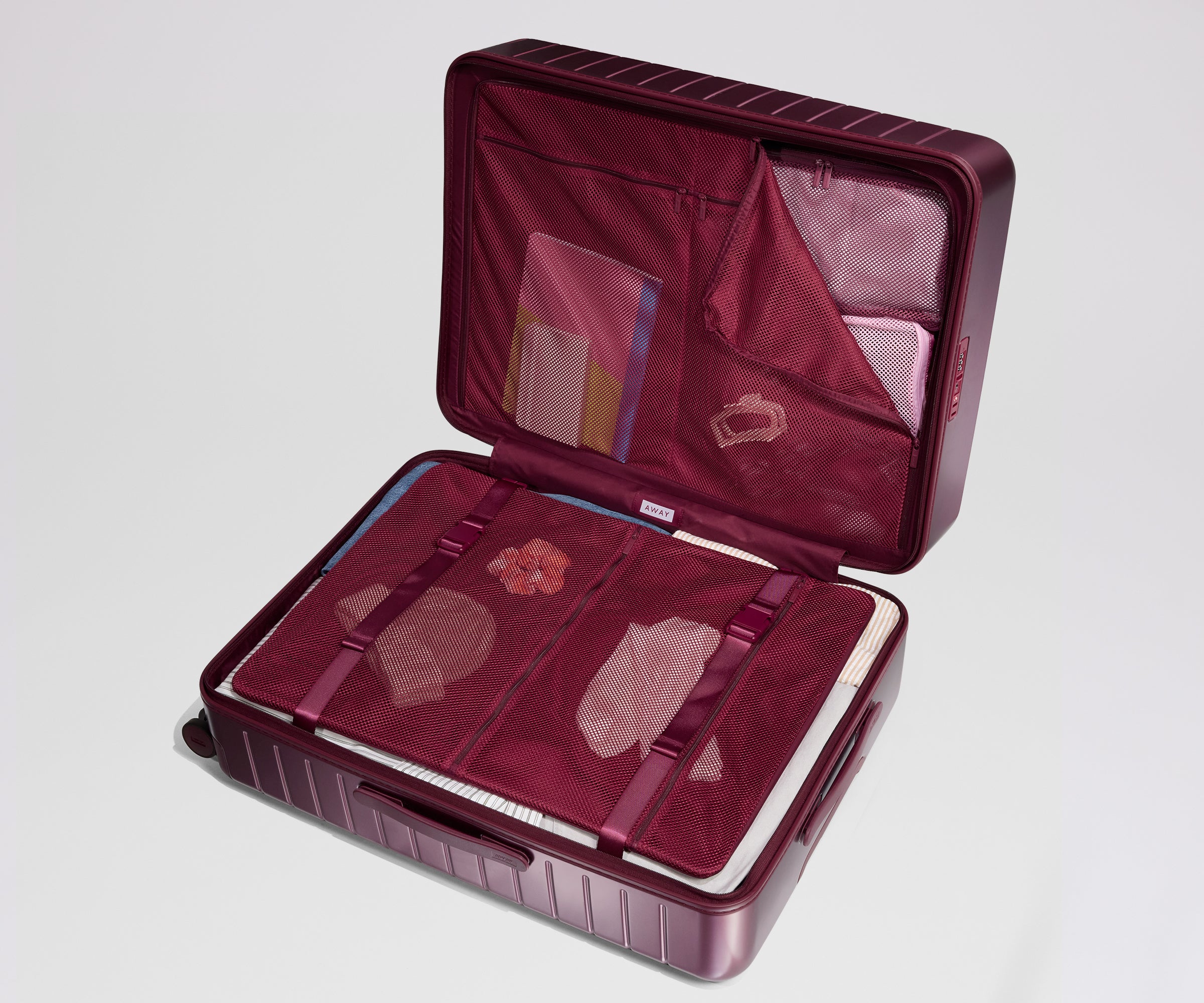 Browse Medium Suitcases in Ruby Haze | Away
