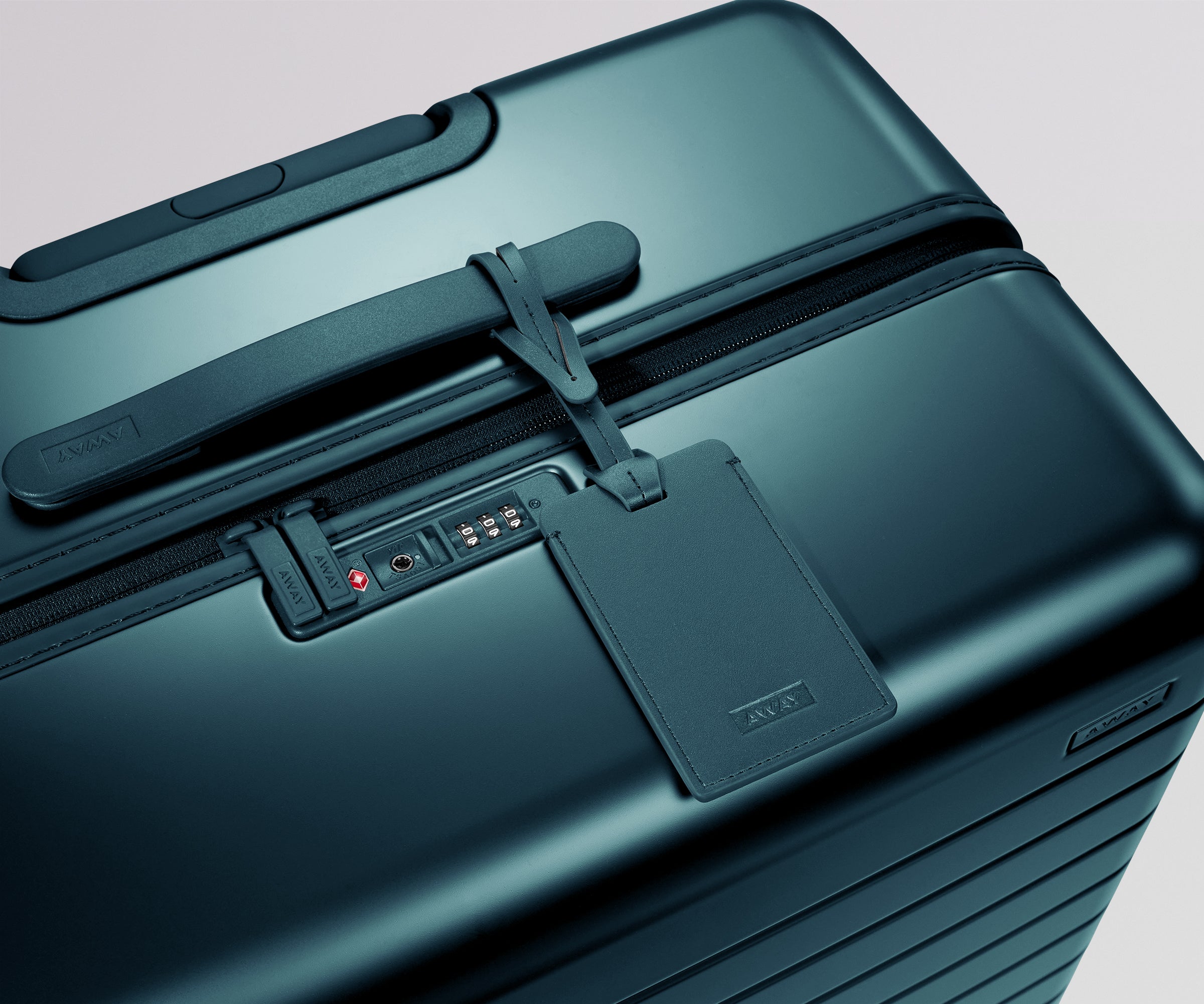 Shop Large & Checked Suitcases in Stormy Teal | Away