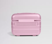 Pink travel case on a light gray background