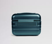 Teal travel case on a light gray background