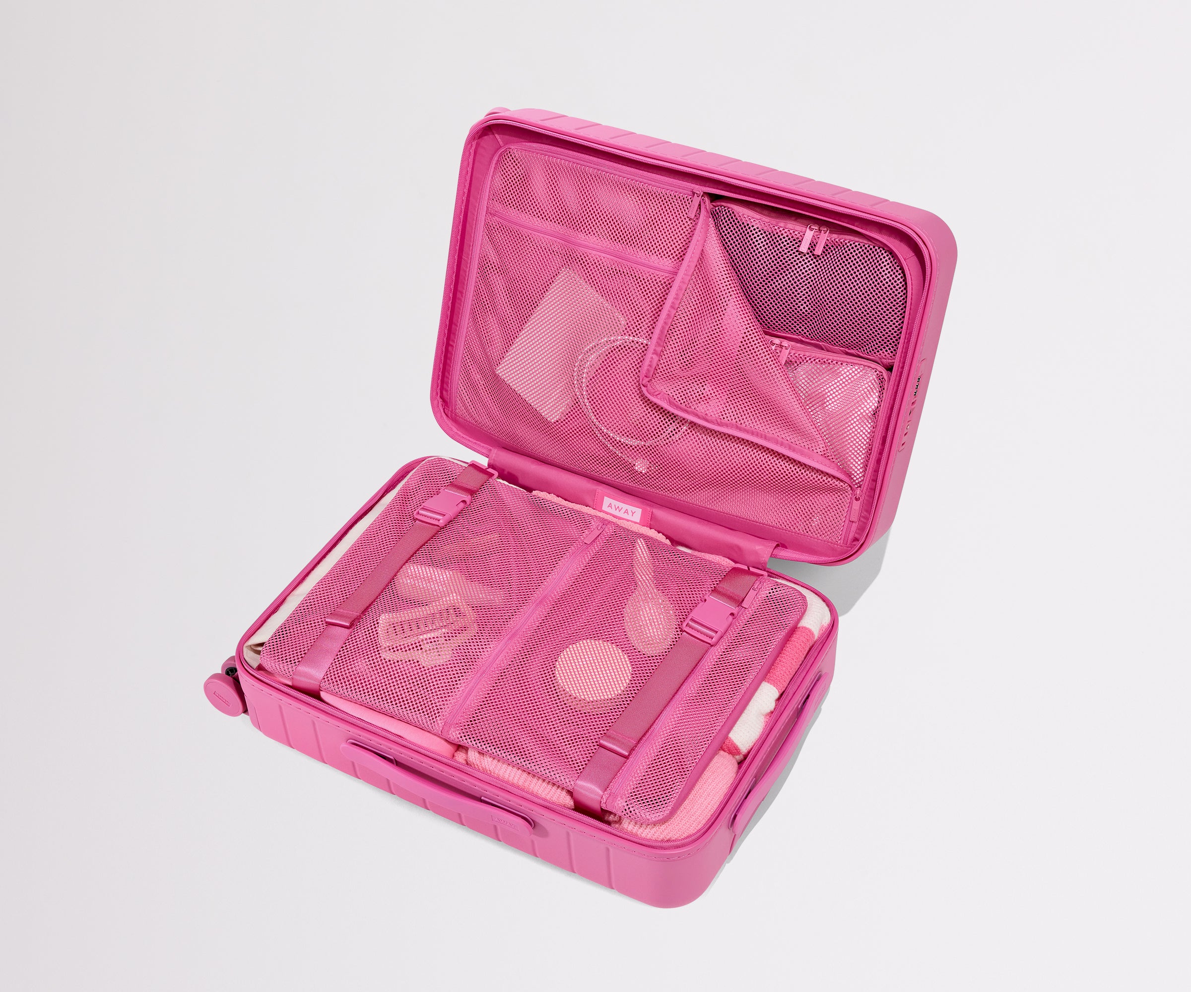 Bigger Carry-On Luggage in Island Pink | Away: Built for modern travel