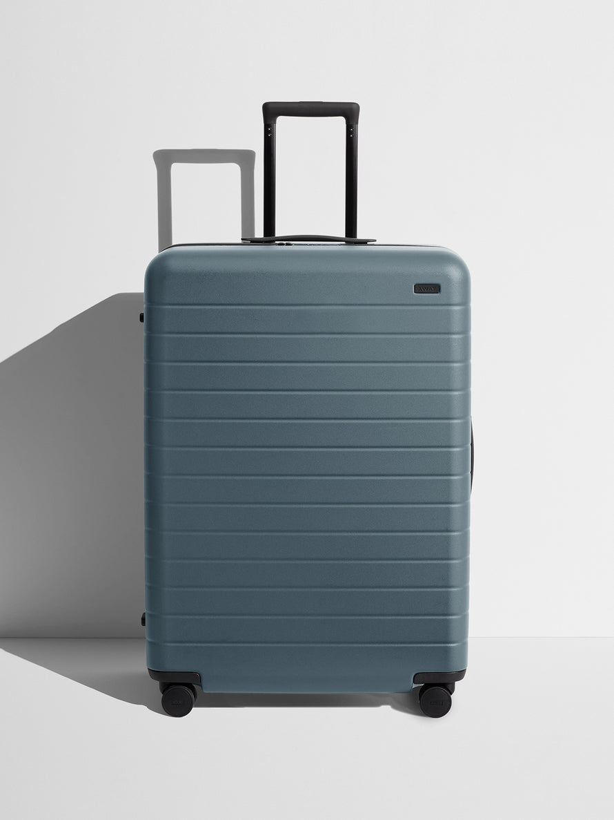 Front view of a Coast Blue Large suitcase