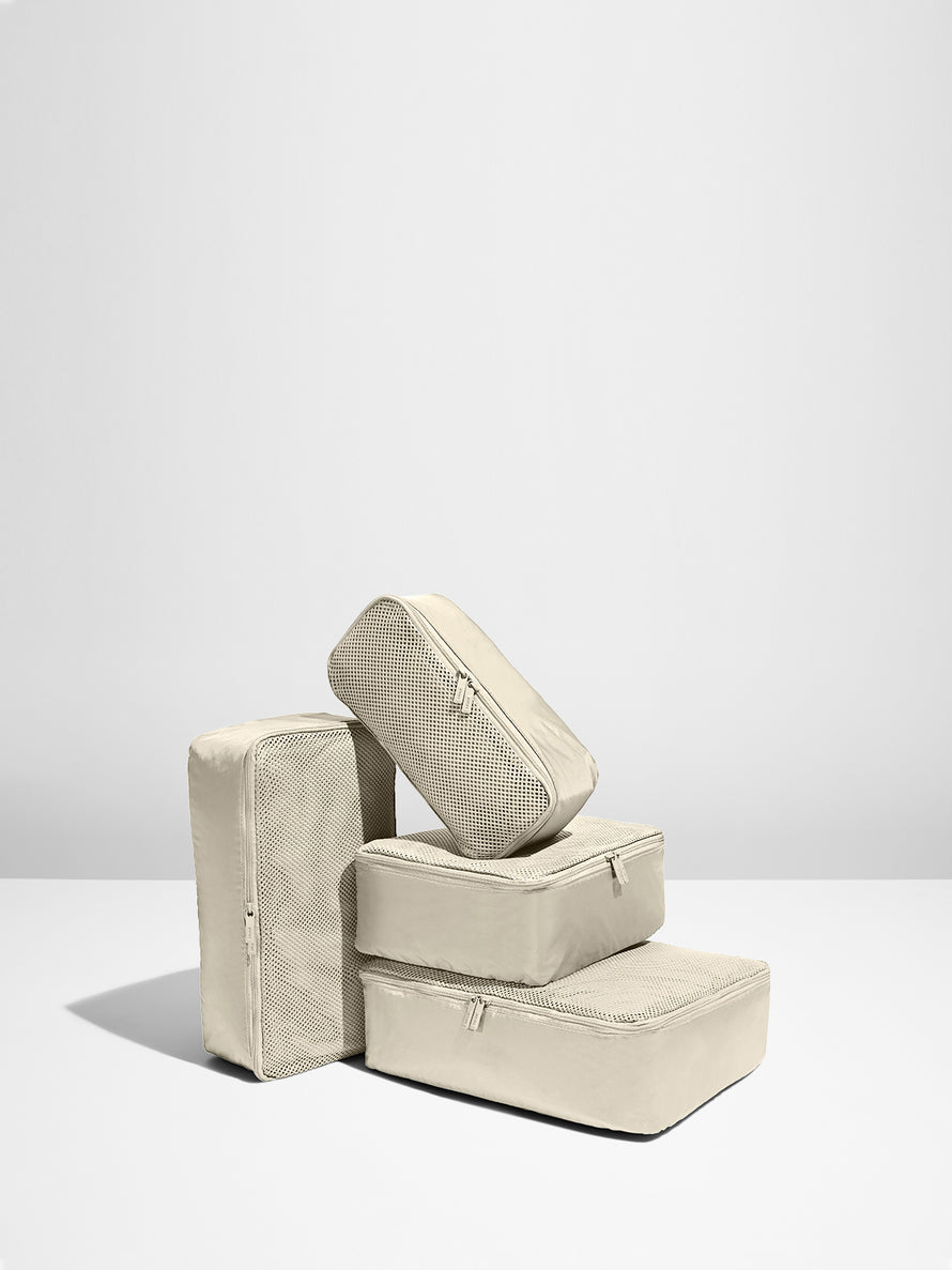 Stack of four Salt White Packing Cubes