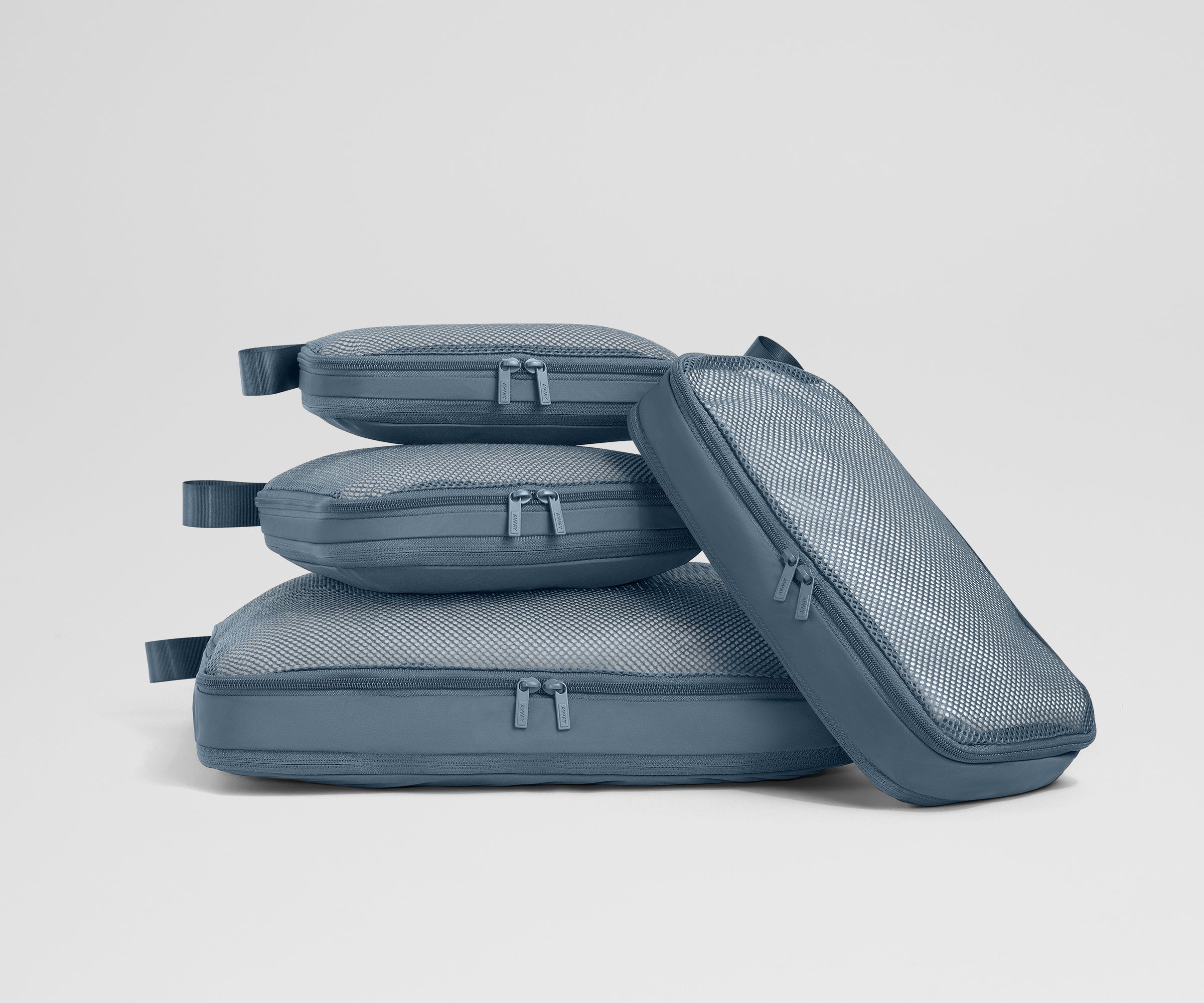 Coastline Compression Compression Packing Cubes in Coast Blue | Away: Built for modern travel
