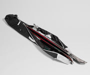 Ski set with black and red design on a gray background