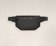 A front view of a sling bag in black.