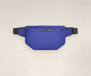 A front view of a sling bag in cobalt.