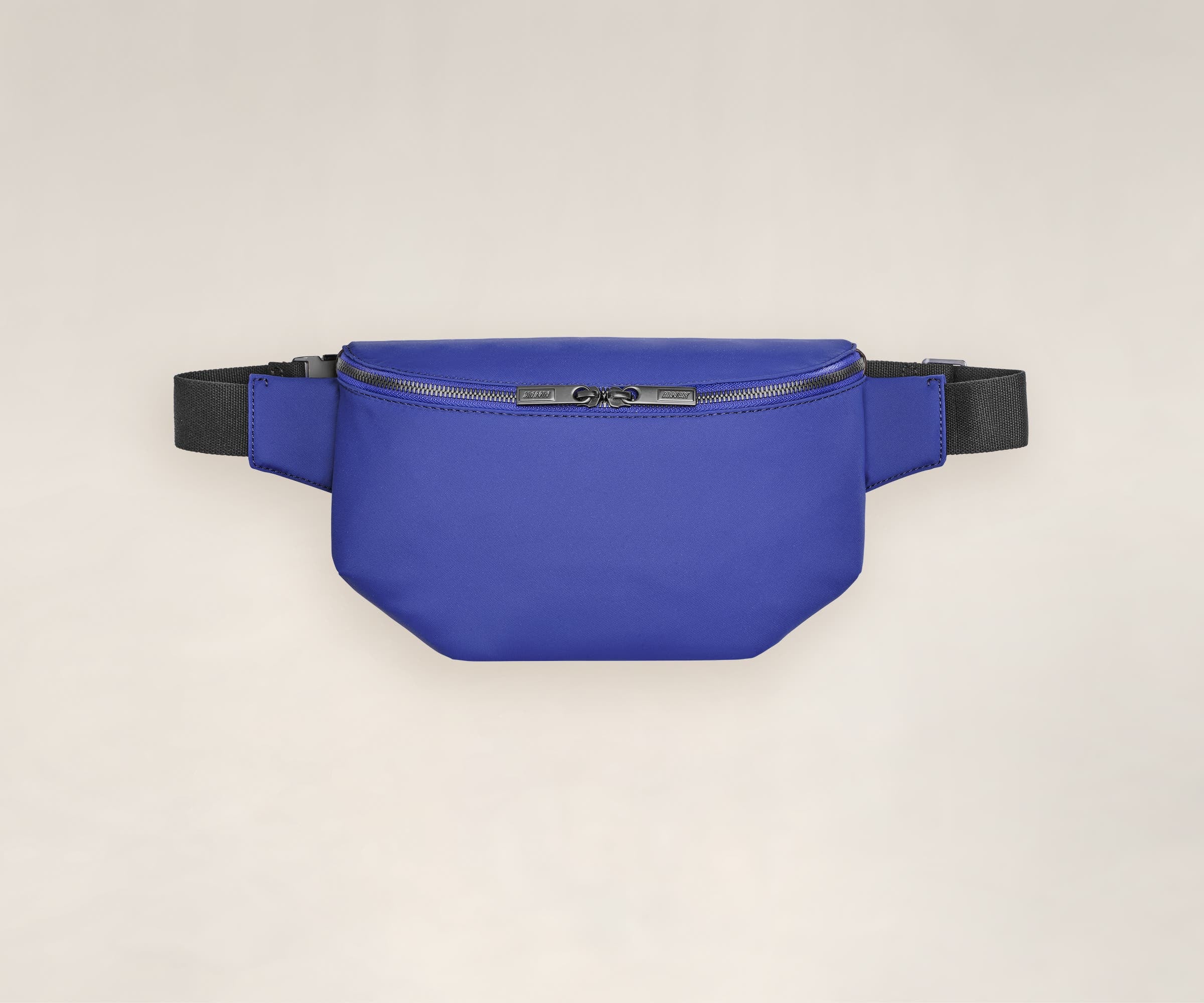 A front view of a sling bag in cobalt.