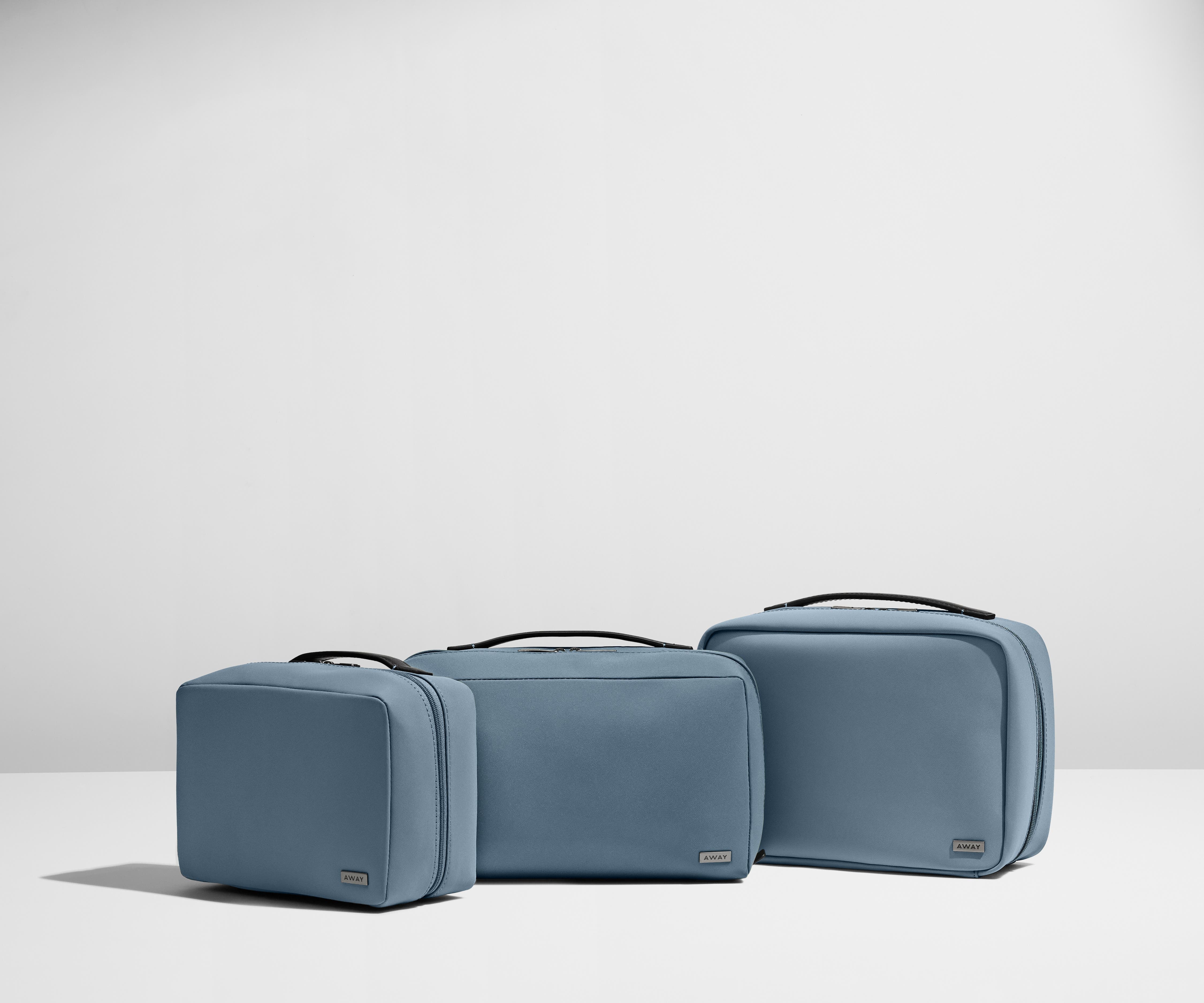Left to right: Small Toiletry Bag, Large Toiletry Bag, Hanging Toiletry Bag