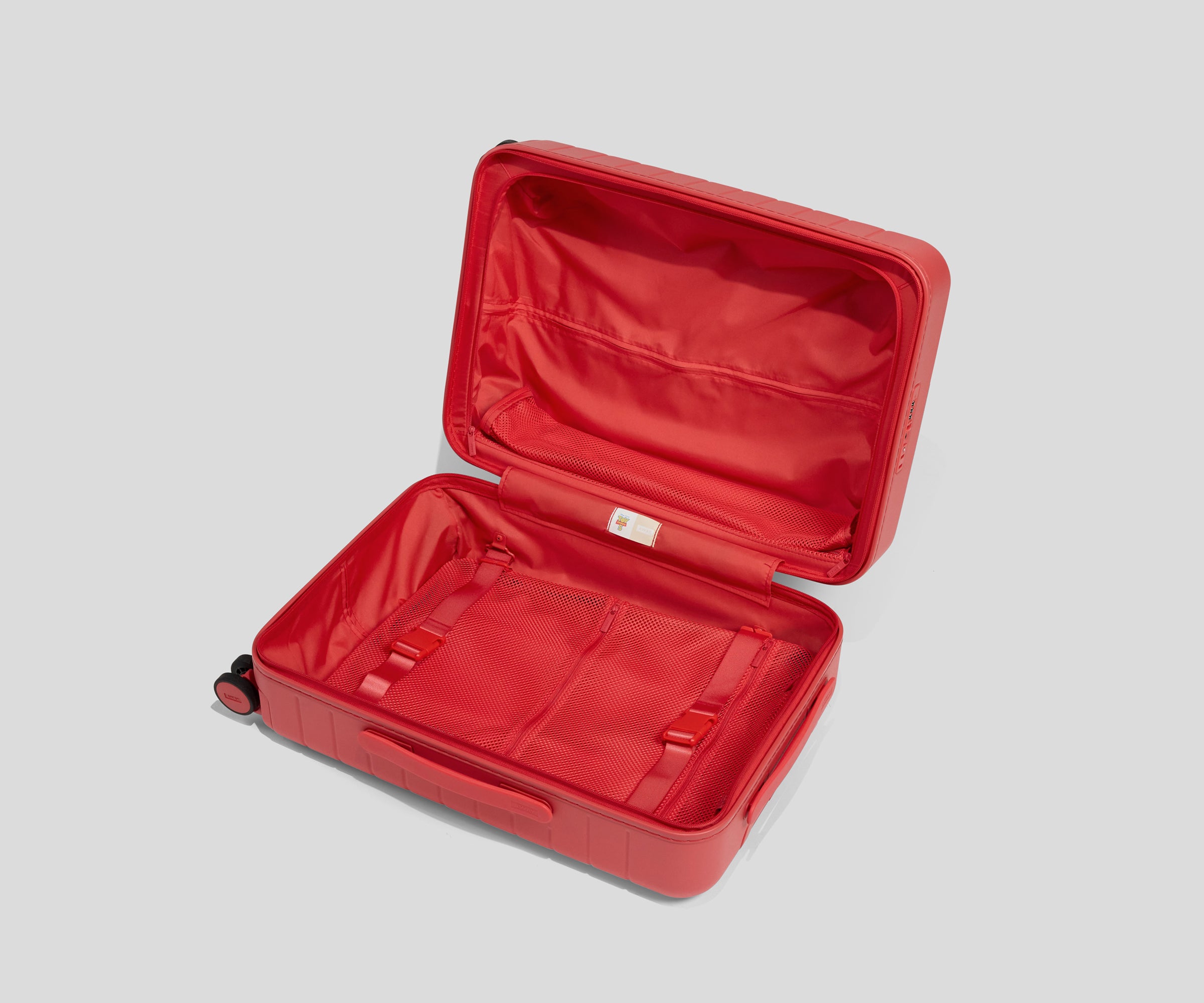 Toy Story 5 Bigger Carry-On in Jessie Red Luggage | Away
