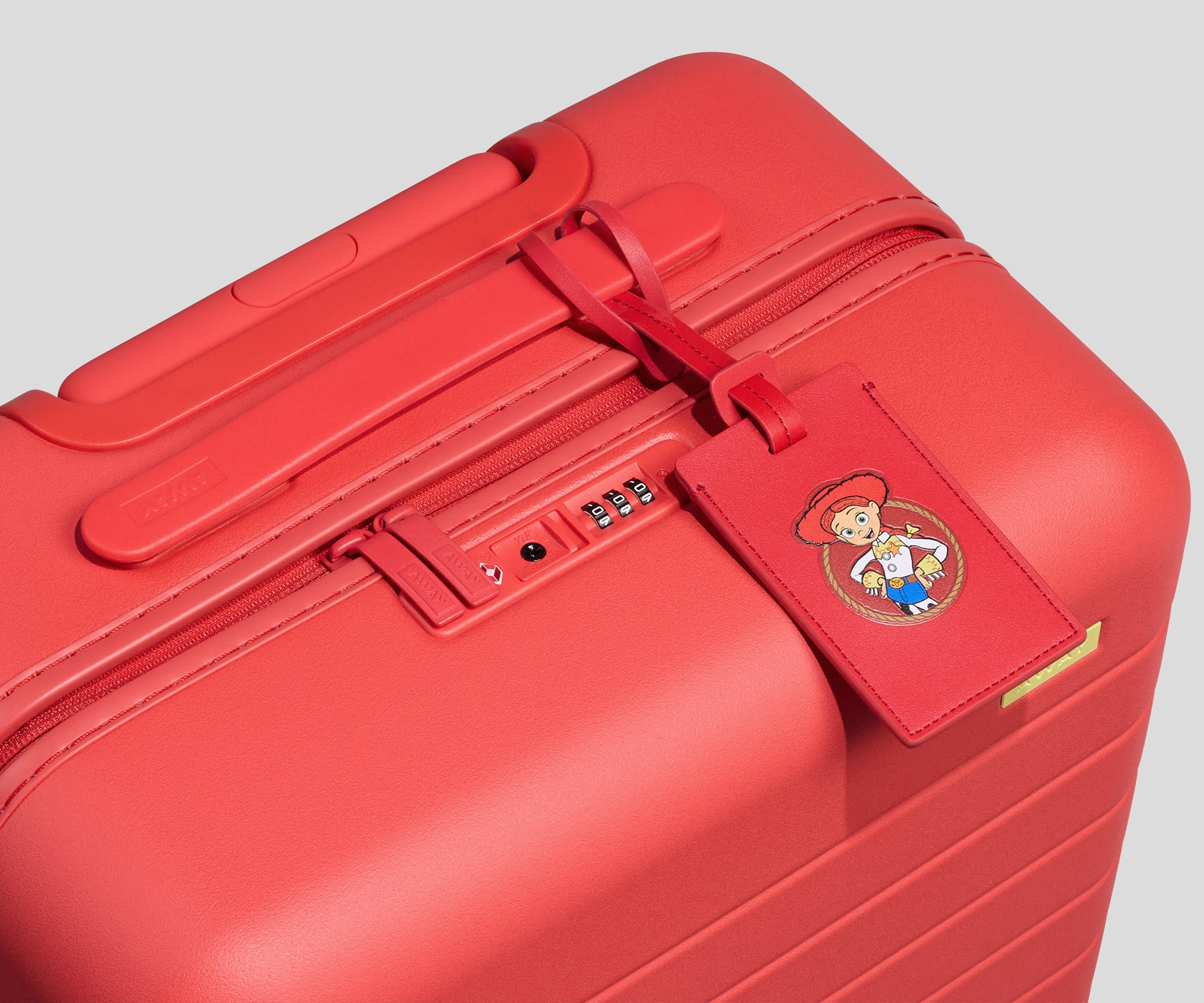 【Na】トイストーリー５　トラベルバッグ Toy Story 5 Bigger Carry-On in Jessie Red Luggage | Away