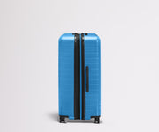 Side product view of The Large Flex suitcase shown fully expanded