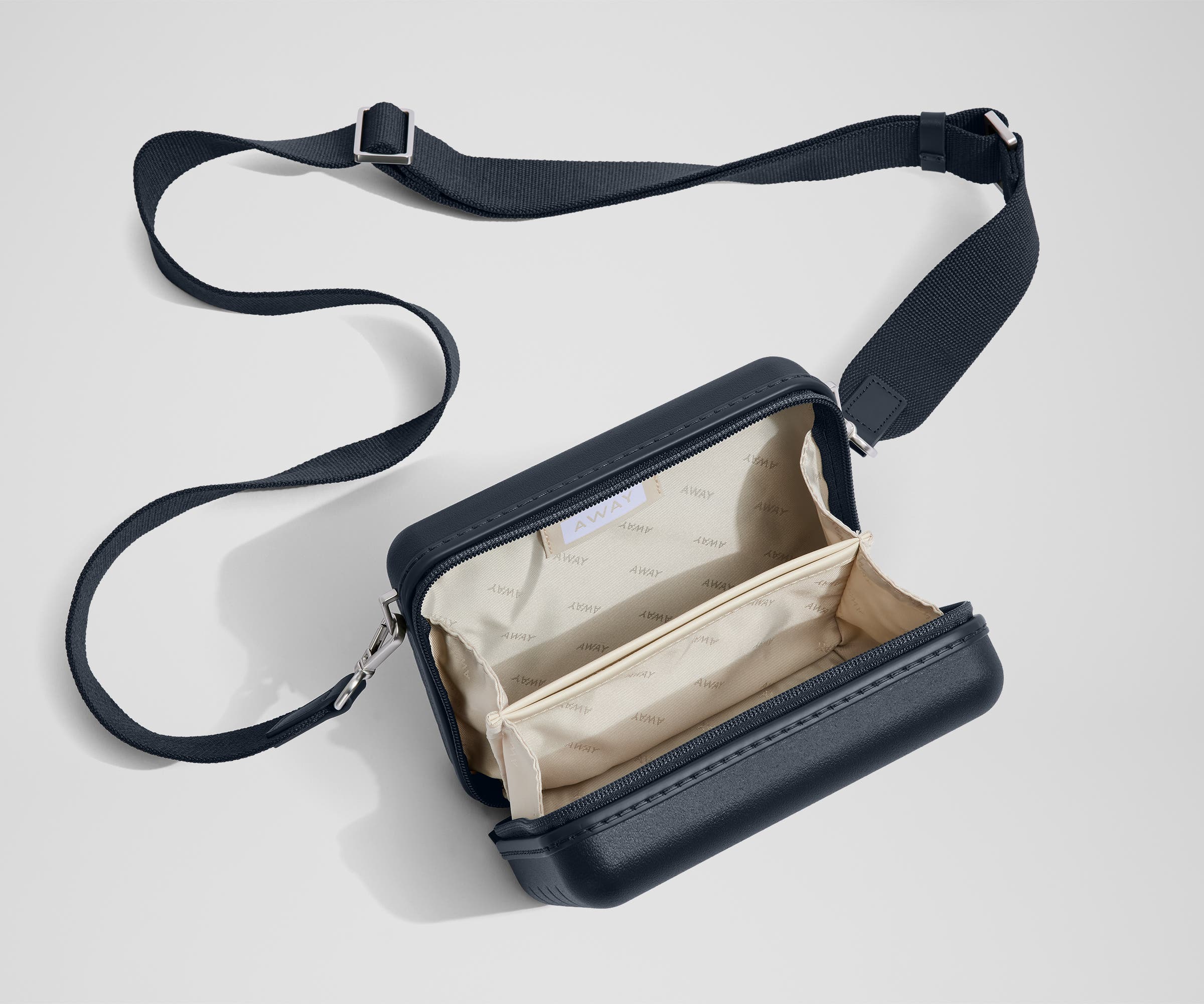 crossbody bag for travel on style Away Mini Crossbody In Navy Blue