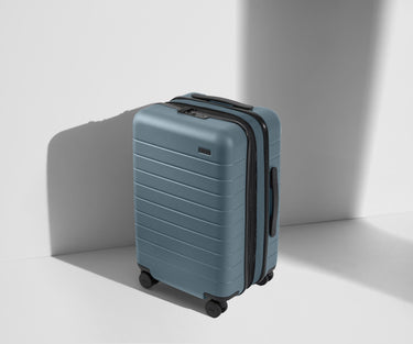 Angled product view of The Carry-On Flex suitcase in Coast Blue