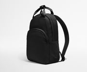 Video of a person packing the Featherlight Backpack with daily essentials