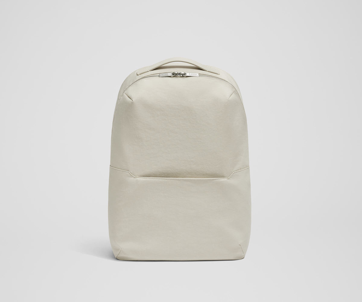 Front view of the The Everywhere Zip Backpack in Salt White Textured Nylon