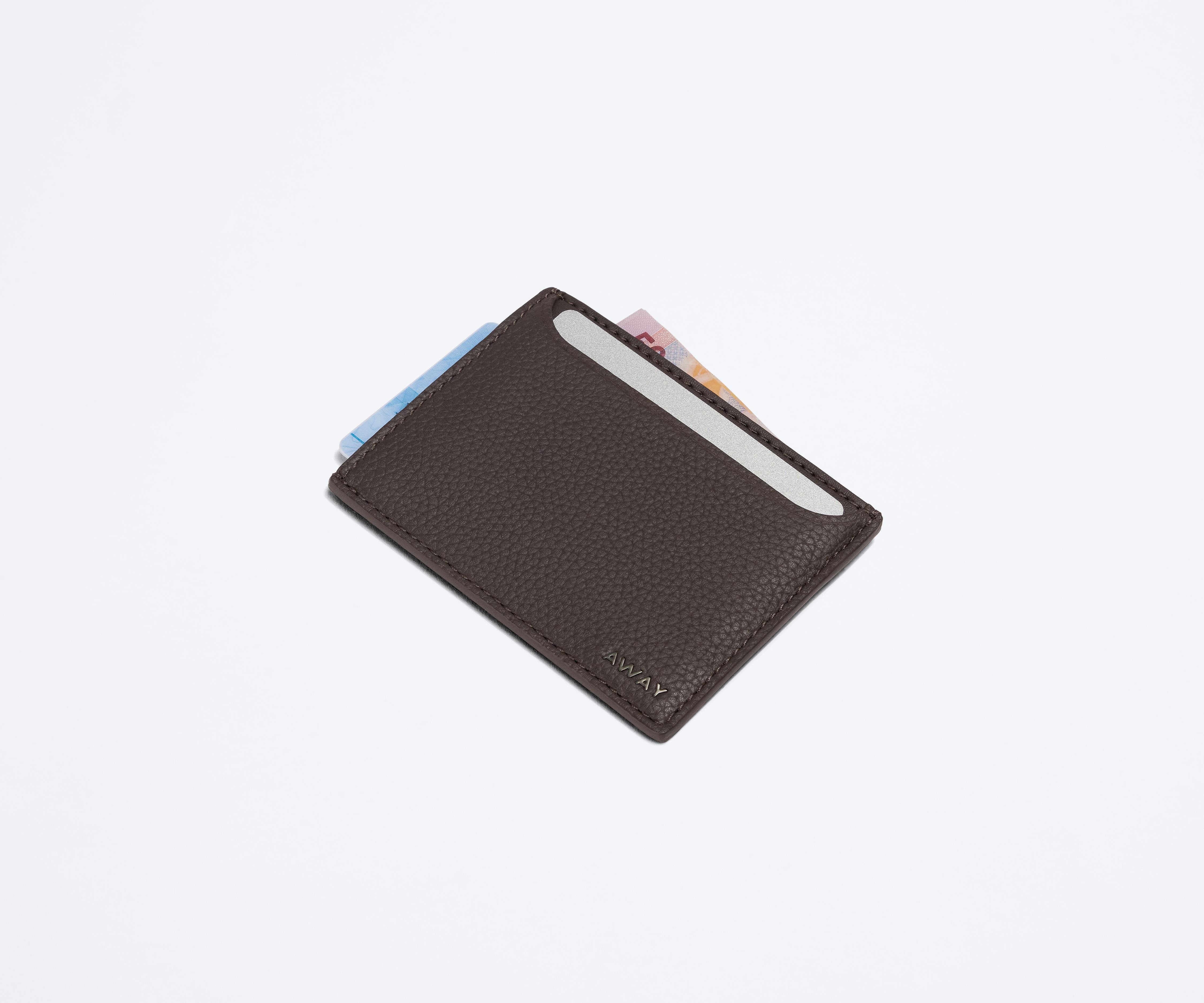 Card case filled with money and credit cards