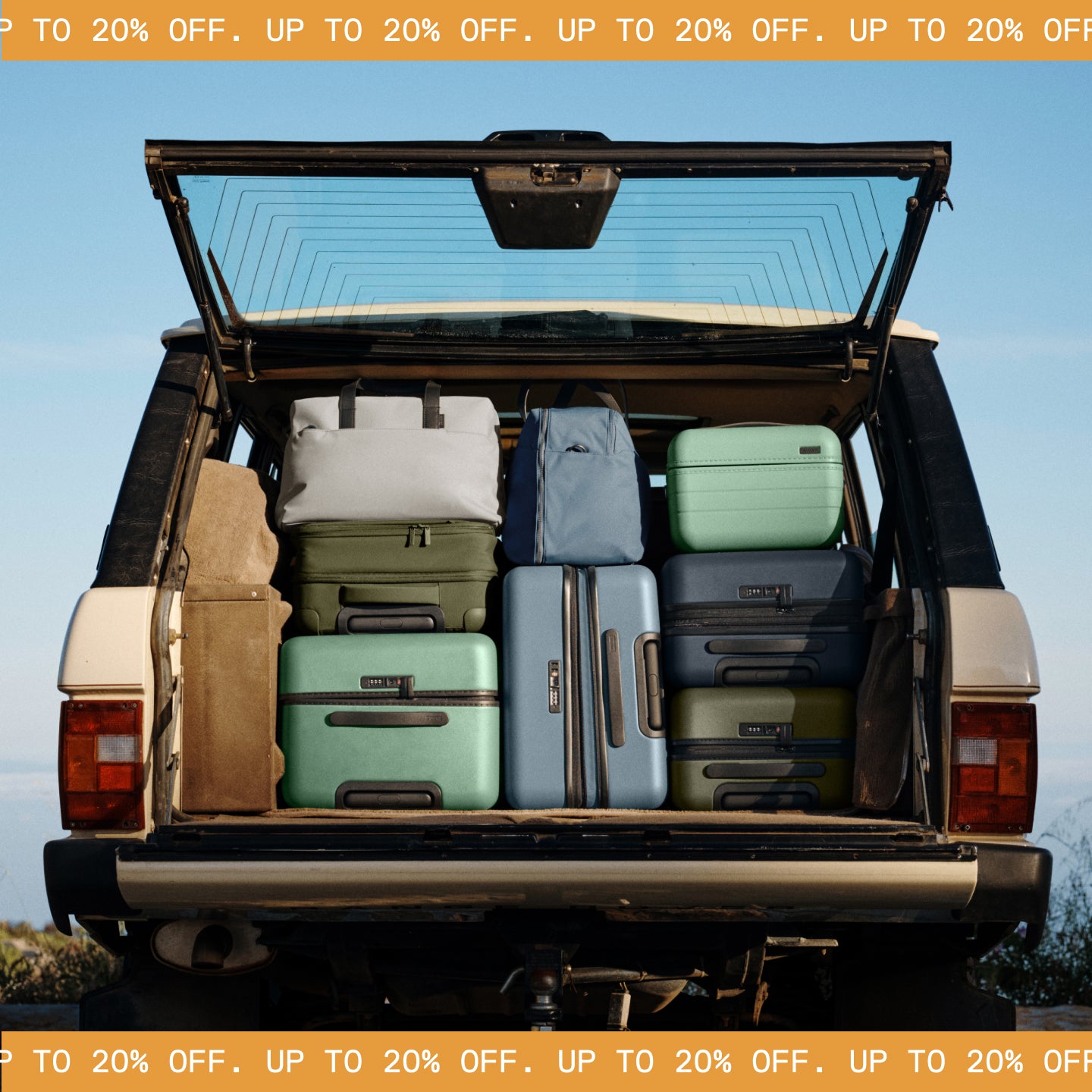 Open car trunk with suitcases and promotional text overlay