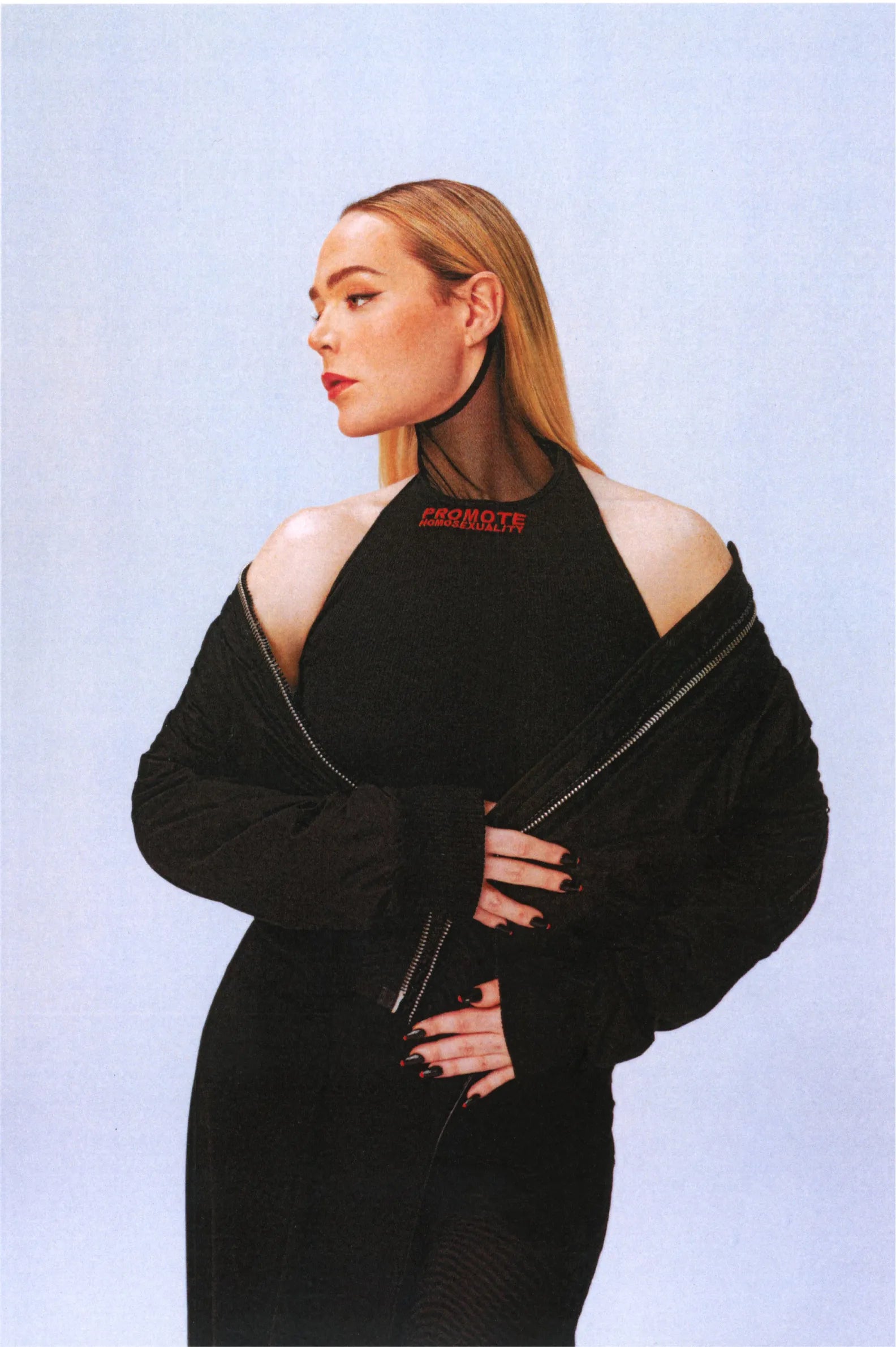 a portrait of Willie Norris in a black outfit