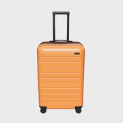 The Bigger Carry-On Flex in Sorbet Orange