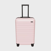 The Bigger Carry-On in Blush Pink
