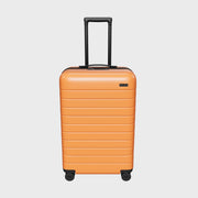 The Bigger Carry-On in Sorbet Orange